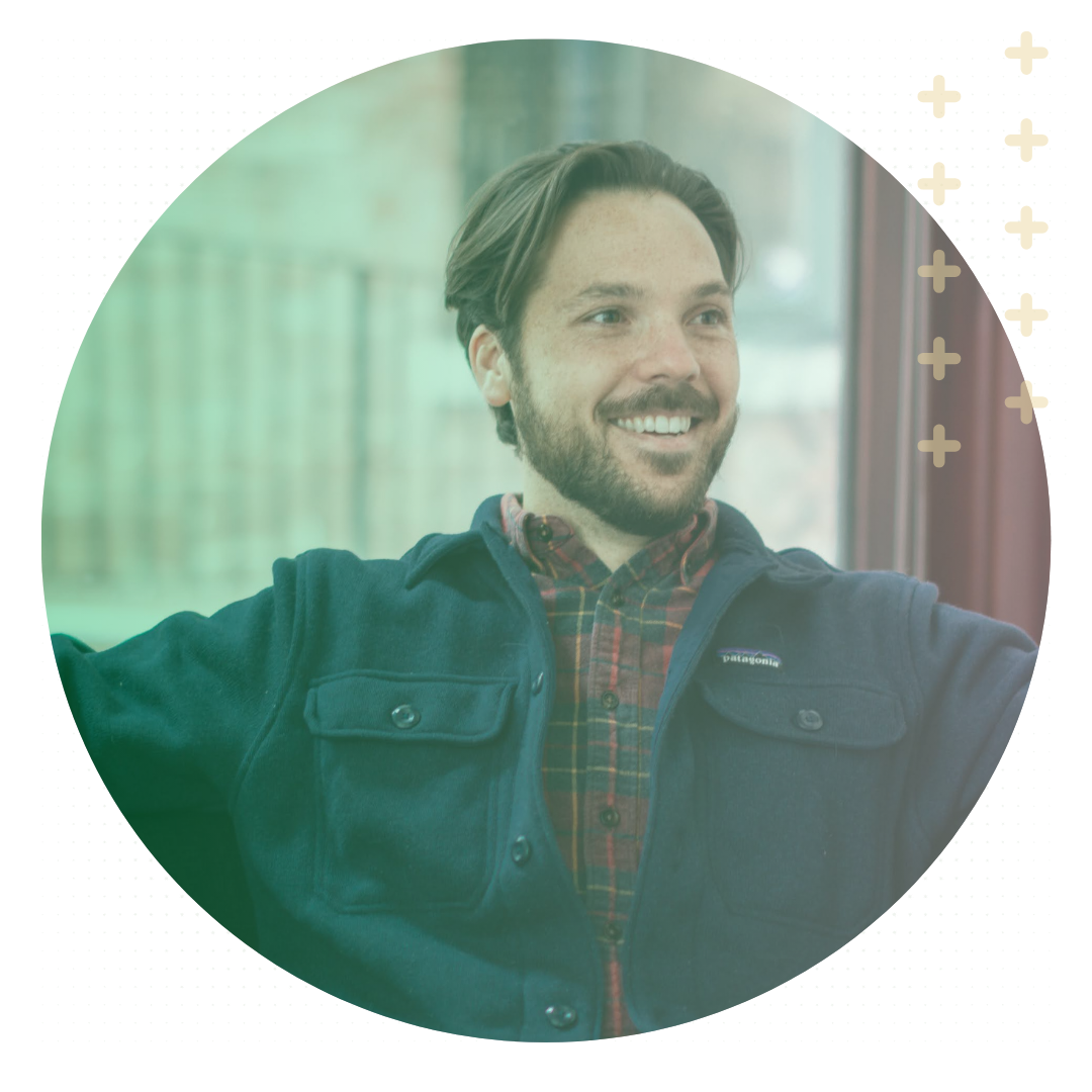 Picture of a man in patagonia sweater, smiling.